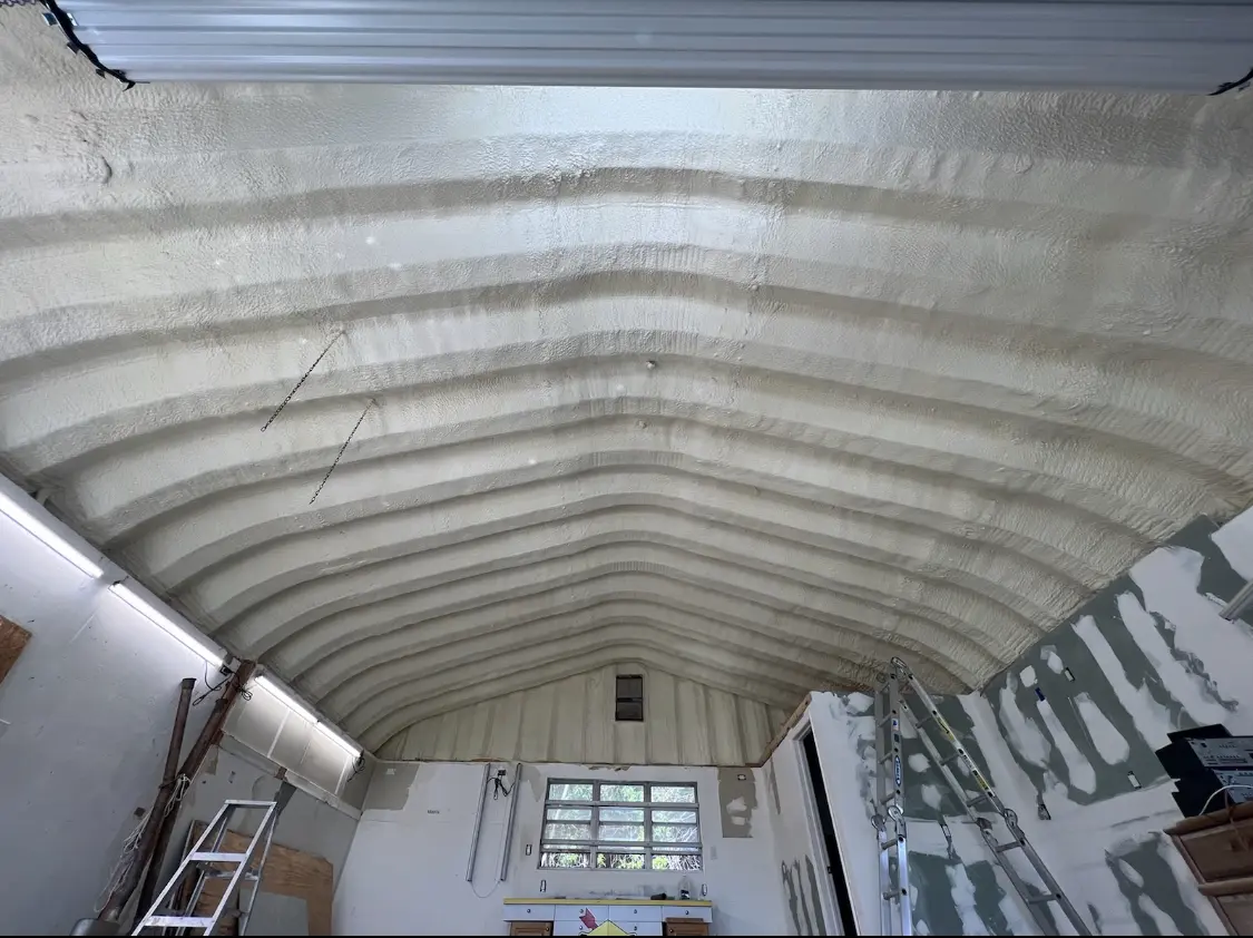 Spray polyurethane foam applied to the underside of a metal roof deck in North Platte